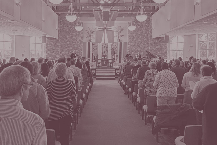 View up the center aisle of Christ UMC's main sanctuary during a Sunday morning worship.