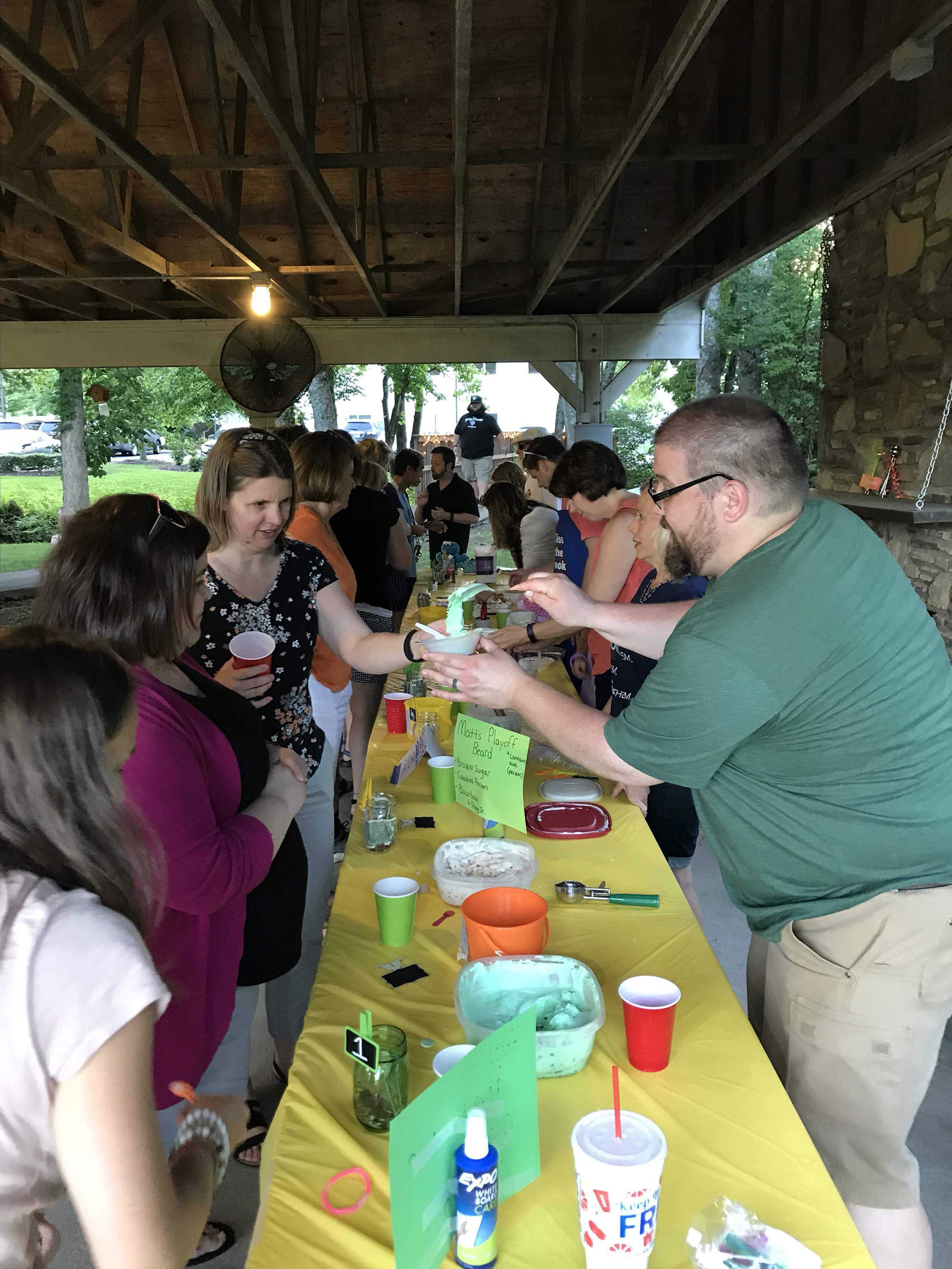 Guests try samples of homemade icecream served by contestants in the icecream contest at Christ UMC's Firefly Festival in Franklin, TN.